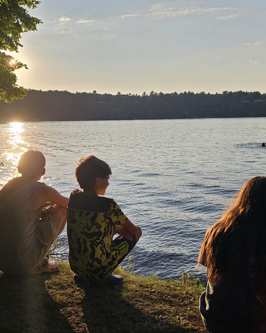 Michigan lake evening lifestyle photo with people by the water